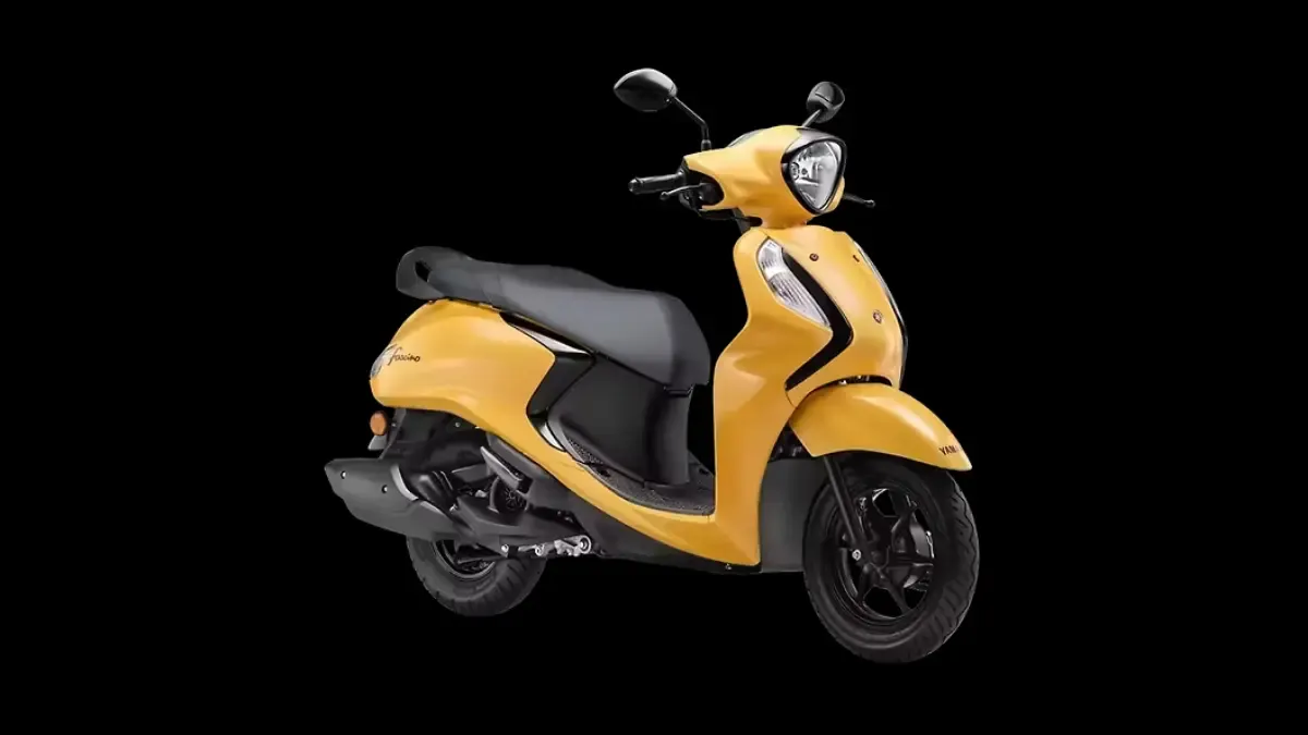Potret Yamaha Fascino 125 dengan tampilan warna kuning.
